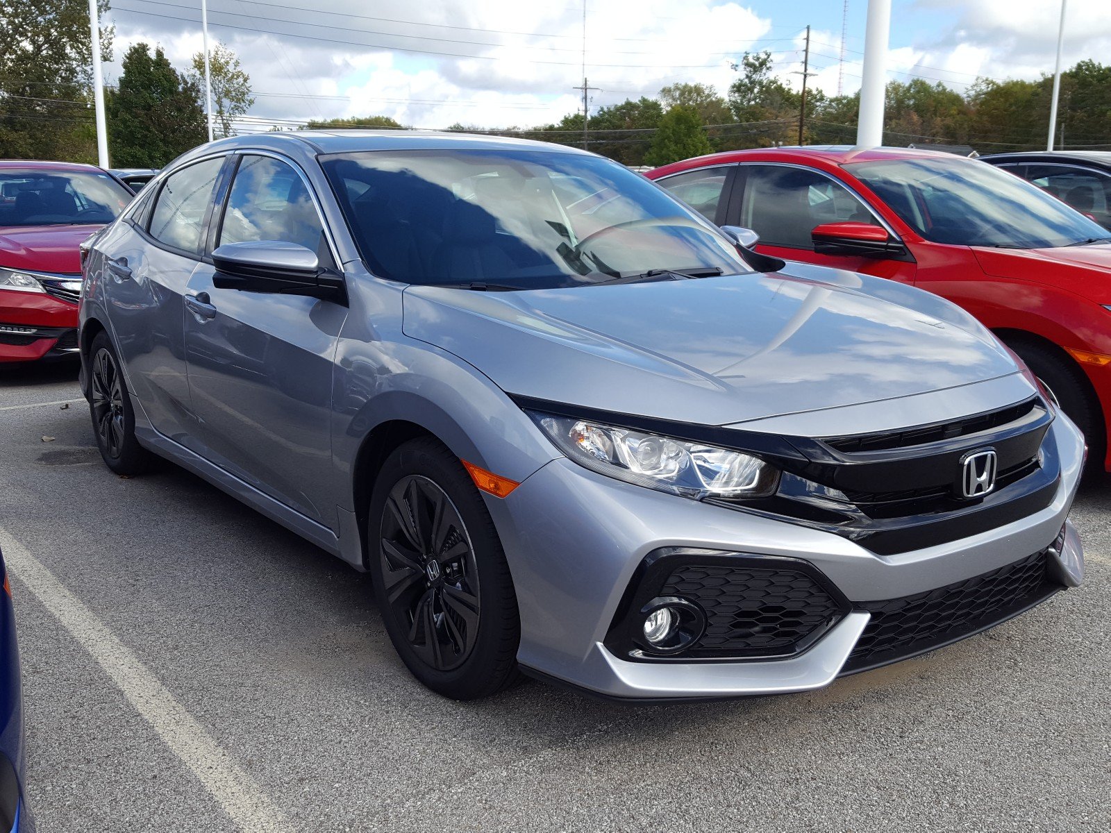 New 2018 Honda Civic Hatchback EX-L Navi CVT Hatchback in Erie #HA2063